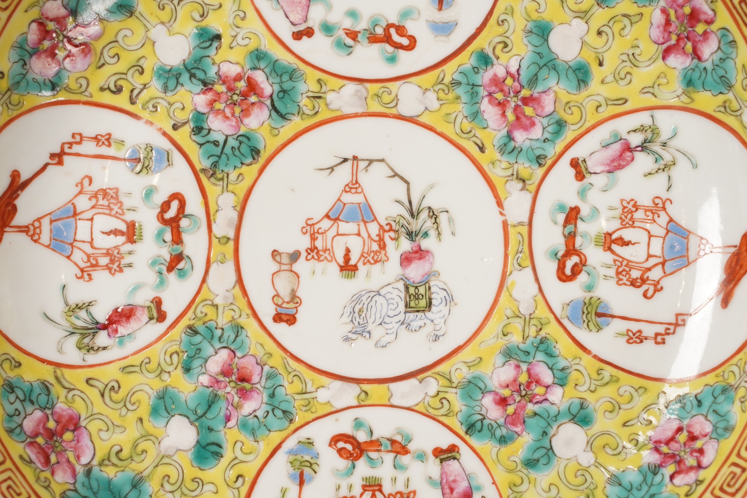 A pair of Chinese yellow ground medallion saucer dishes, Guangxu six character marks, early 20th century